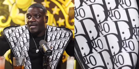 akon in fake dior|akon drink champs.